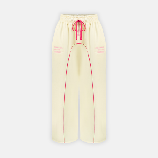 Bullseye Sweatpants in cream and pink with a drawstring waist and pink piping down the front of each leg