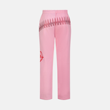 Valentine Sweatpants in pink with a red heart graphic and a red studded design across the back