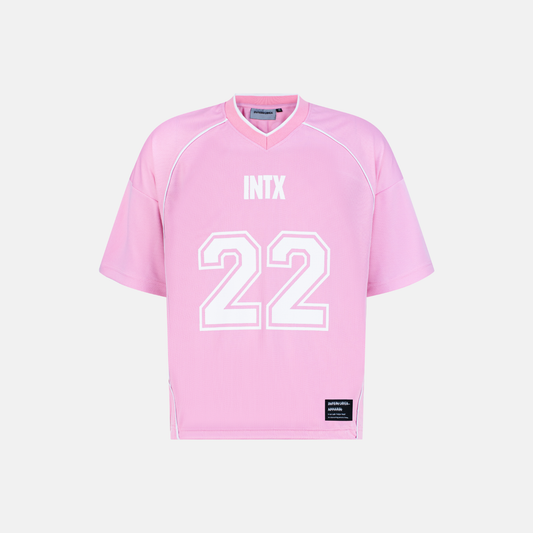 Origin Jersey in pink with white trim, INXT and number 22 on front