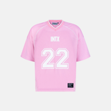 Origin Jersey in pink with white trim, INXT and number 22 on front