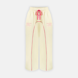 Bullseye Sweatpants in cream and pink with a drawstring waist and pink piping down the front of each leg