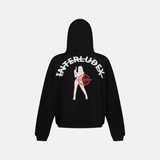 Back of a black CHARCOAL ZIP UP HOODIE with a white graphic of a woman holding a gun and a red target